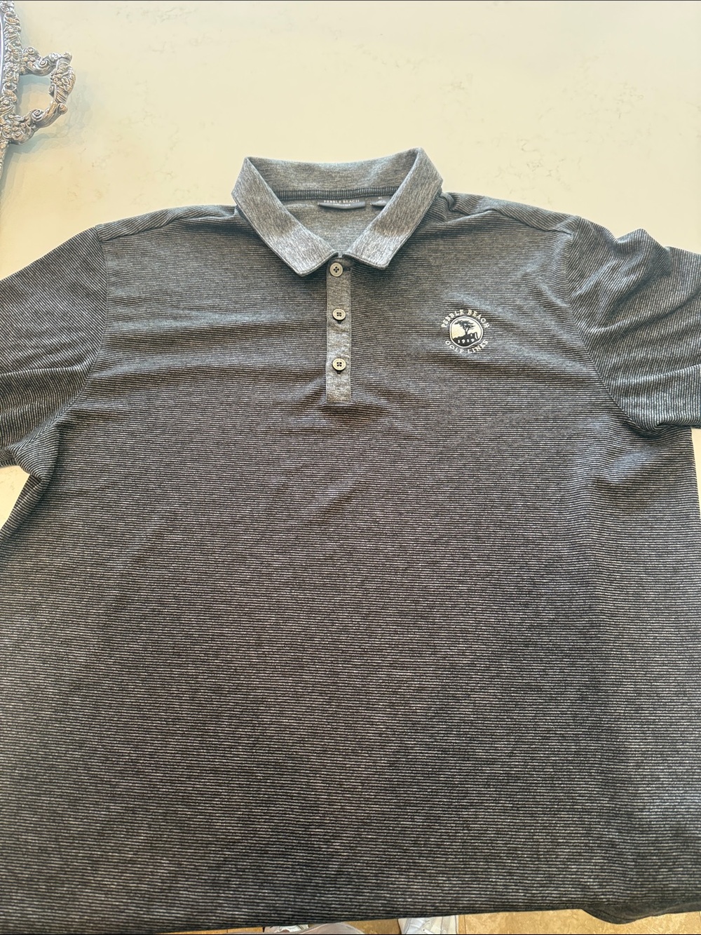 Men's Heather Charcoal Polo with Subtle Chest Emblem